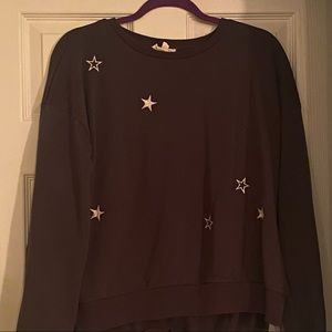 Grey Crewneck with white stars.